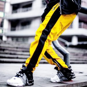 Pantaloni colorblock cu dungi Design modern cu dungi colorblock pentru un look de impact