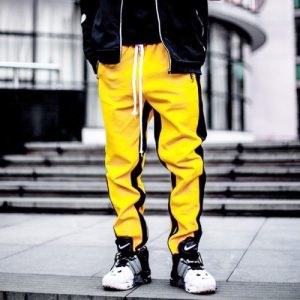 Pantaloni colorblock cu dungi